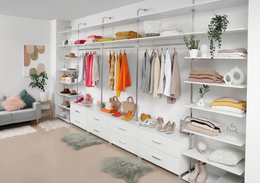 Organized closet showcasing stylish mix-and-match pieces for a budget-conscious wardrobe